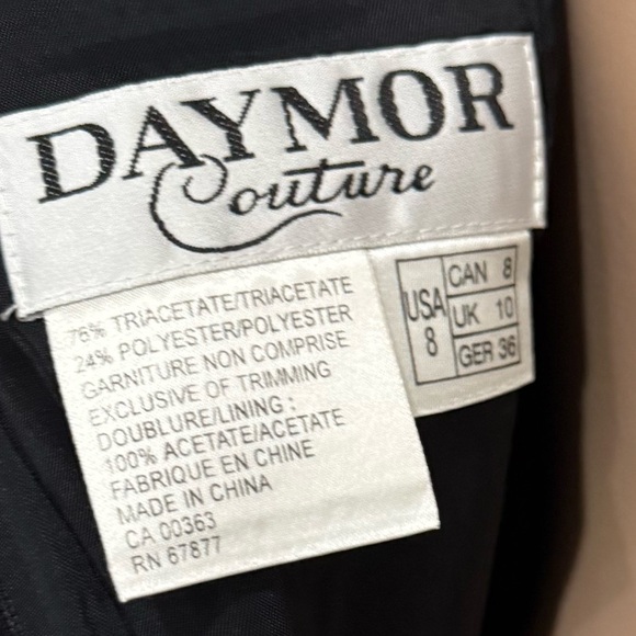 Stunning black Daymor Couture evening dress featuring intricate beaded detail. - Picture 6 of 6